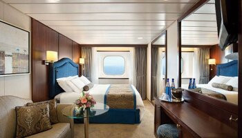 1548636829.1179_c370_Oceania Cruises Sirena Accommodation deluxe-ocean-view-stateroom.jpg